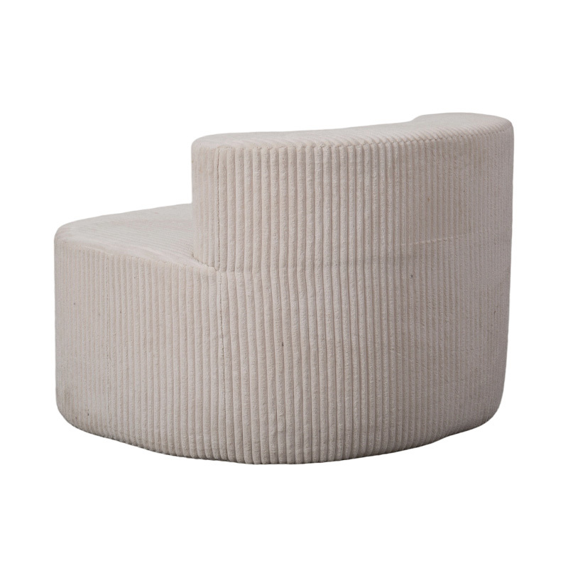 Eenpersoonsbank van lichtbeige corduroy met gebogen rugleuning Eenpersoonsbank van lichtbeige corduroy met gebogen rugleuning