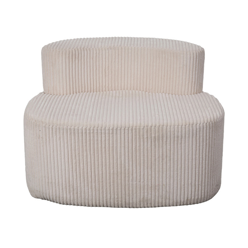 Eenpersoonsbank van lichtbeige corduroy met gebogen rugleuning Eenpersoonsbank van lichtbeige corduroy met gebogen rugleuning